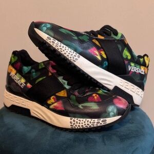 Limited Edition women's Versace multi colored hearts print sneakers. Size 6